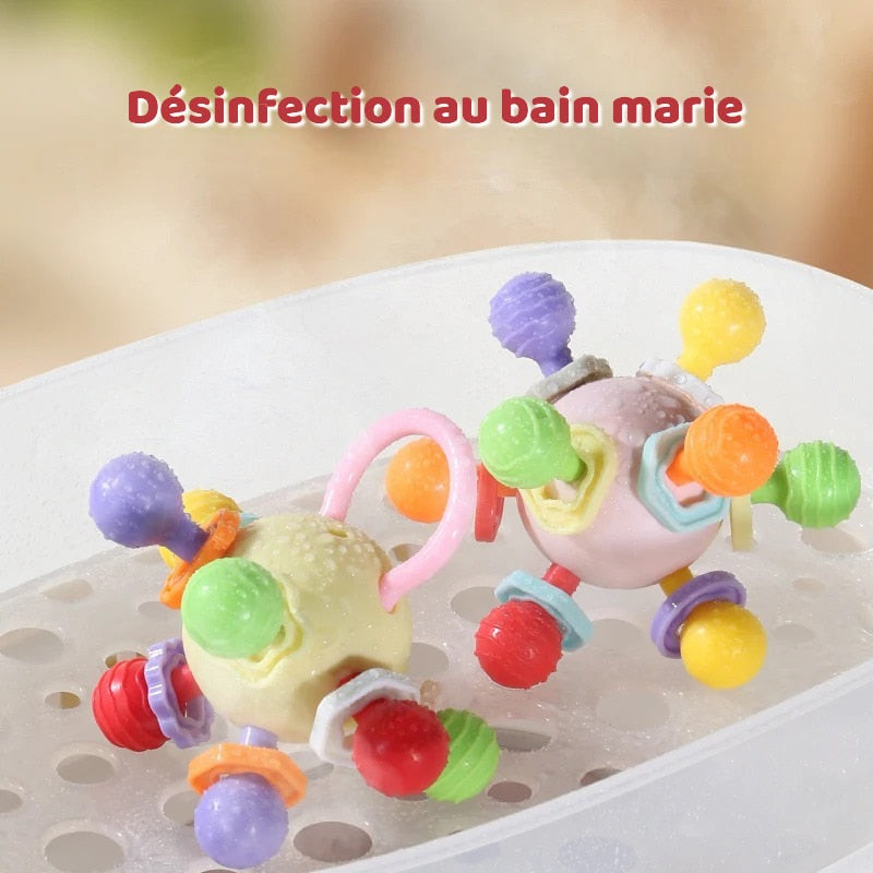 🎈 Balle d’Éveil Souple – Préhension Facile pour Petites Mains ! 👶